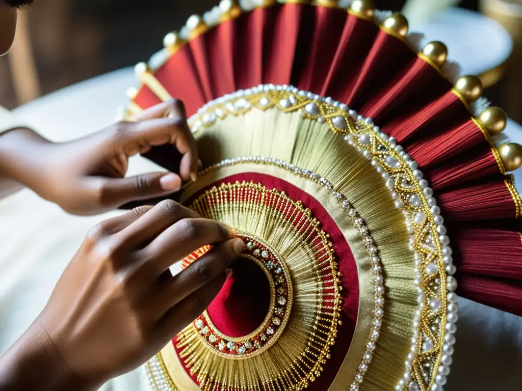 Un artesano balinés cosiendo a mano detallados hilos dorados y carmesí en un tocado ceremonial