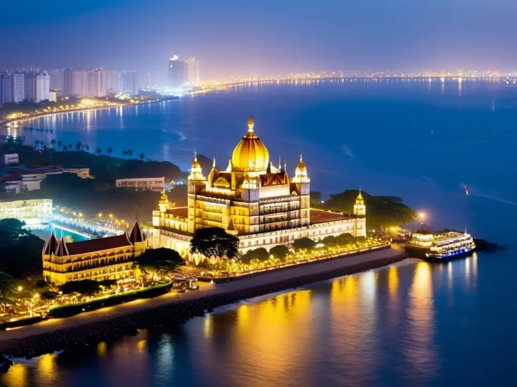 Vista aérea de noche de los hoteles de lujo en Mumbai, destacando el resplandor de las luces en contraste con el mar Arábigo